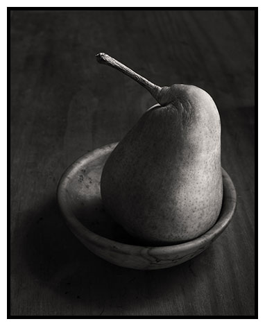 pear in woode bowl